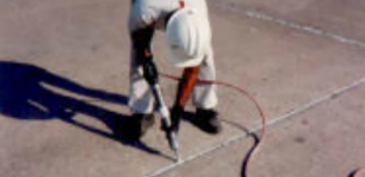 person applying caulking to a joint