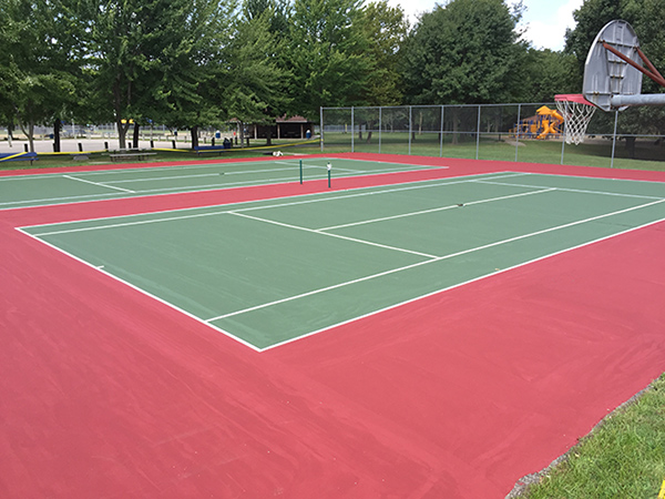 view of a tennis court after resurfacing